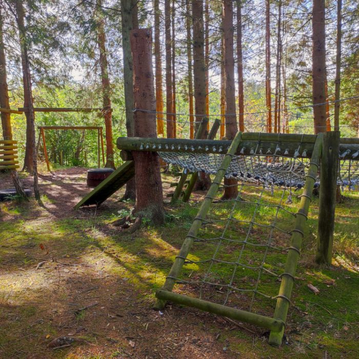 Hidden amongst the trees is our Venchie, with lots of opportunity to swing, climb and explore.